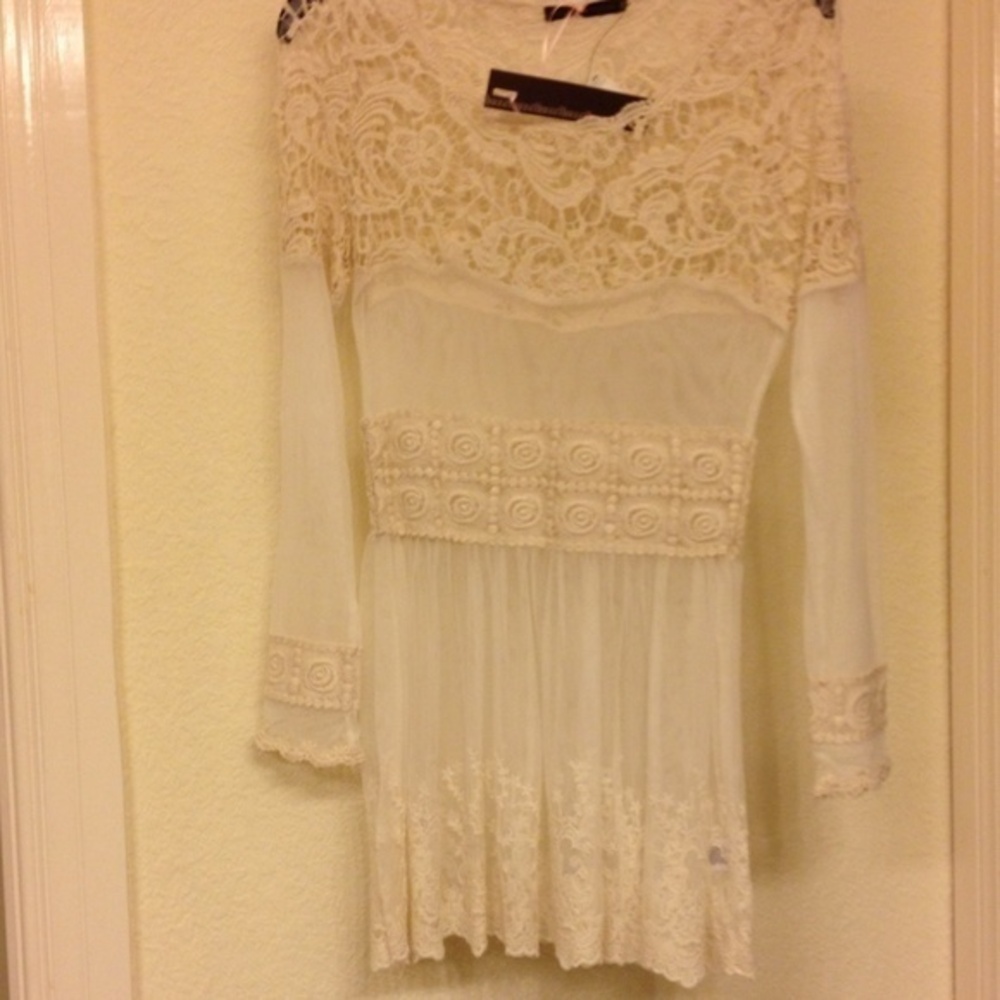 Ivory unique top.